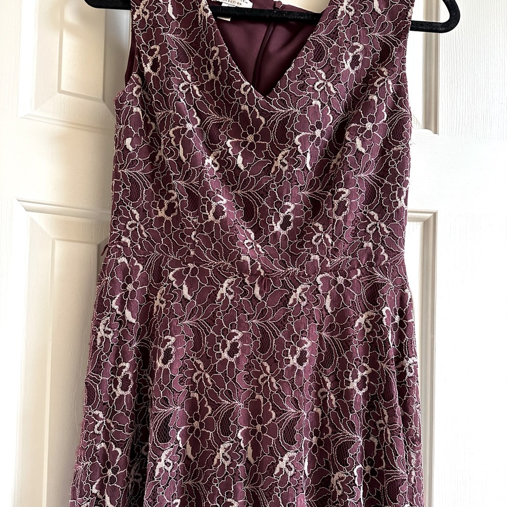 Cocktail lace dress with gold belt